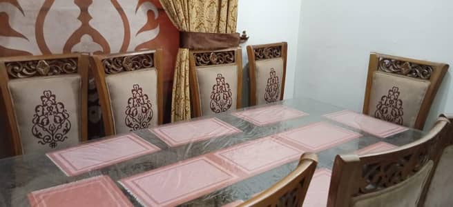 Solid wood 8 chairs Dinning table in brand new condition