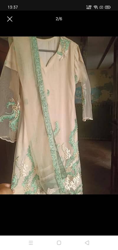 Embroidered elegant frock with inner kmeez stitched and net dupptat