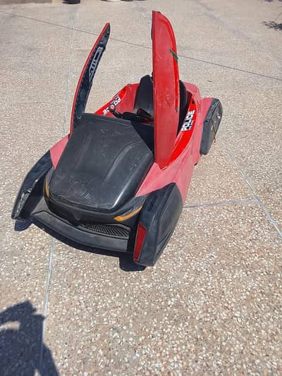 kids driving  car in good  condition