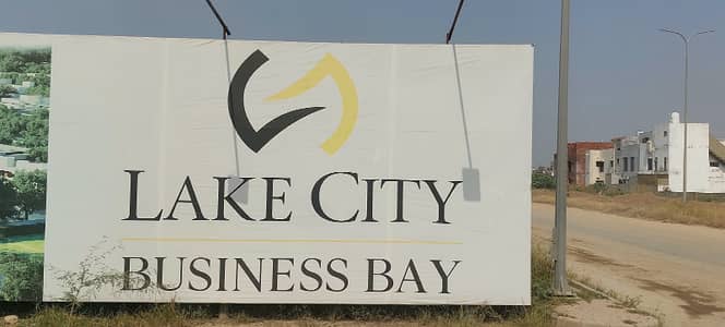 5 Marla Park Facing Commercial Plot in Business Bay Area, Lake City, Lahore.
