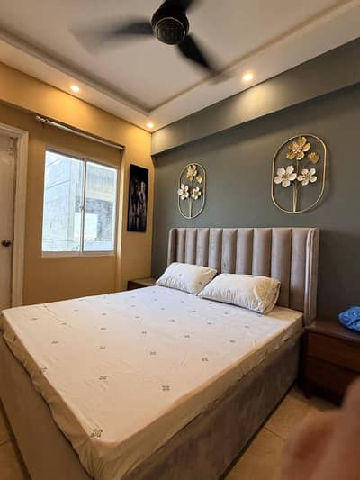 Daily Basis Apartment & Rooms Per day Perweek Short stay Available in E-11 Islamabad