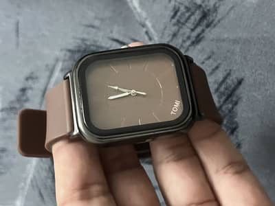 Brown colour rubber straps watch ,perfect for collage and office wear