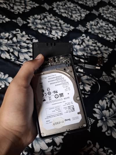 Hard drive with external cover and games