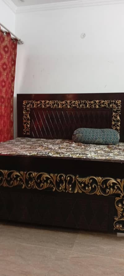 bed with side tables and dressing table