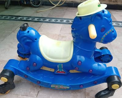 Kids HORSE (Rocking+ Wheels) 2 in 1 in working good condition for Sale