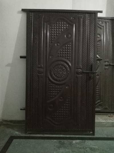 Iron Doors with large size ,, 6 by 3.5 foot each + chocolate painted