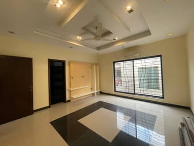 1 Kanal Slightly Used Modern Design House For Rent In DHA Phase 1 Lahore.