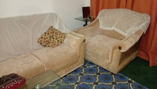 5 seater sofa center table, and two side tables 9000 m, and chair 5k.