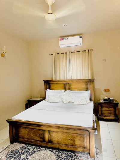 Daily Basis Apartment & Rooms Per day Perweek Short stay Available in E-11 Islamabad