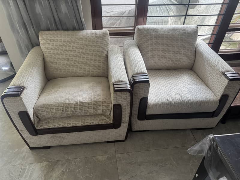 Two 1-seater sofas 1