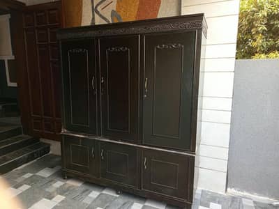 heavy wooden cupboard