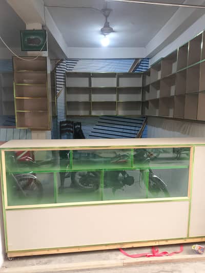 Title: Shop Glass Counter & Wall Shelves for Sale