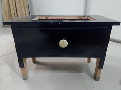 Sewing machine table