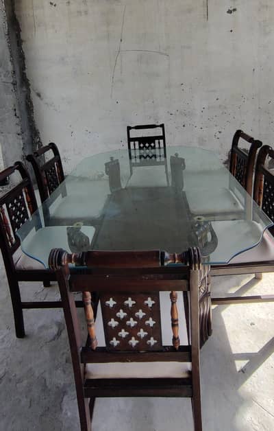 Dining table with glass countertop