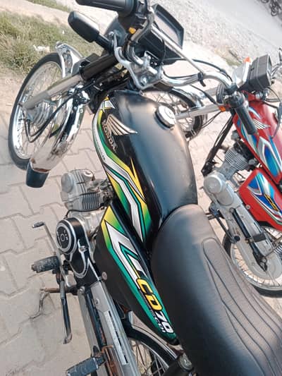 CD 70 2023 model black colour  (location wah cantt )