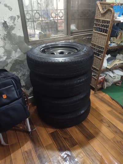 Steel Rim 15 inch 5 nuts  and Dunlop Grantrek 195/80R15 tyres for sale