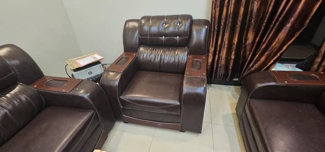 2 sofa sets one with leather poshish and one in cloth poshish