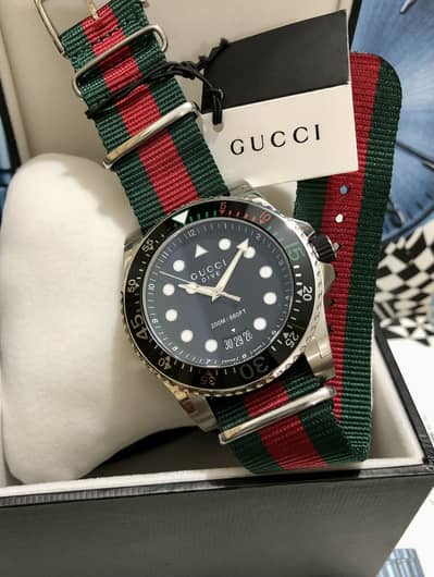 GUCCI DIVER-SWISS MADE-SPORTS MODEL-ORIGINAL & NEW WATCH