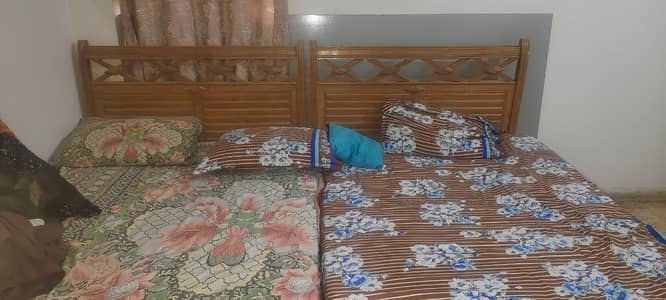 Wooden Double Bed with Headboard – Good Condition