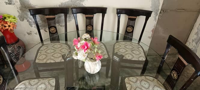 glasse dinning table and 6 chairs