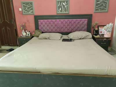 Bed with side tables