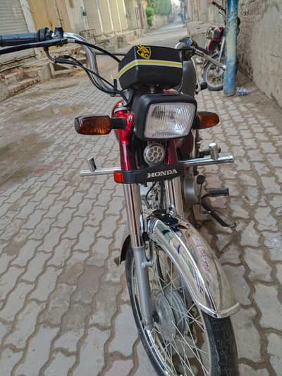 Urgent for sale bike Honda 70cc applied for all documents clear