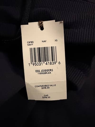 Coach female essential half zip sweatshirt and essential joggers.