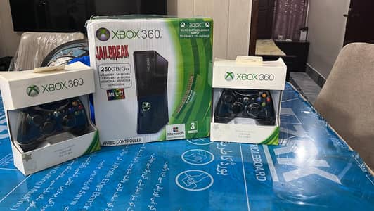 brand new Xbox 360 with 2 charge able remotes