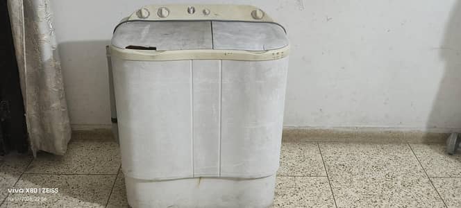 Haier washing machine with dryer.