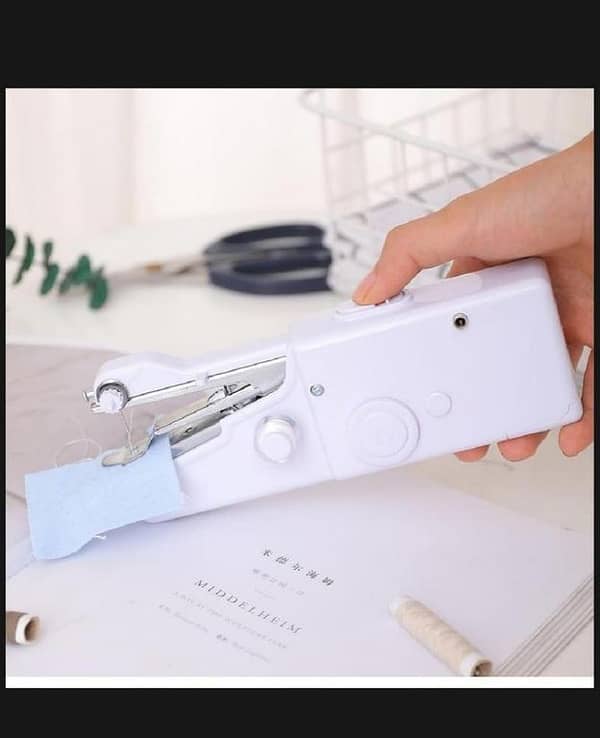T  New Hand Mini Sewing Machine Quick Handy Stitch Sew Needlework Cordless Clothes Fabrics Portable Household Electric Sewing Machine