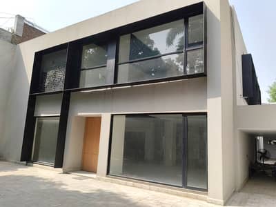 GULBERG ESTATE OFFER,6000 SQFT COMMERCIAL BUILDING FOR RENT LANK MAIN BOULEVARD & MM ALAM GULBERG LAHORE