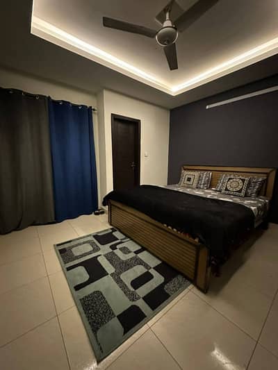 Daily Basis Apartment & Rooms Per day Perweek Short stay Available in E-11 Islamabad