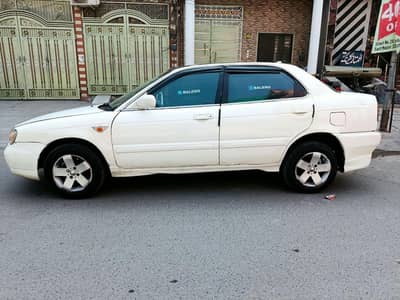 Suzuki Baleno JXR 2005 power steering power windows Chill AC.
