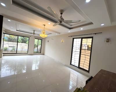 1 Kanal Slightly Used Modern Design House For Rent In DHA Phase 1 Lahore.