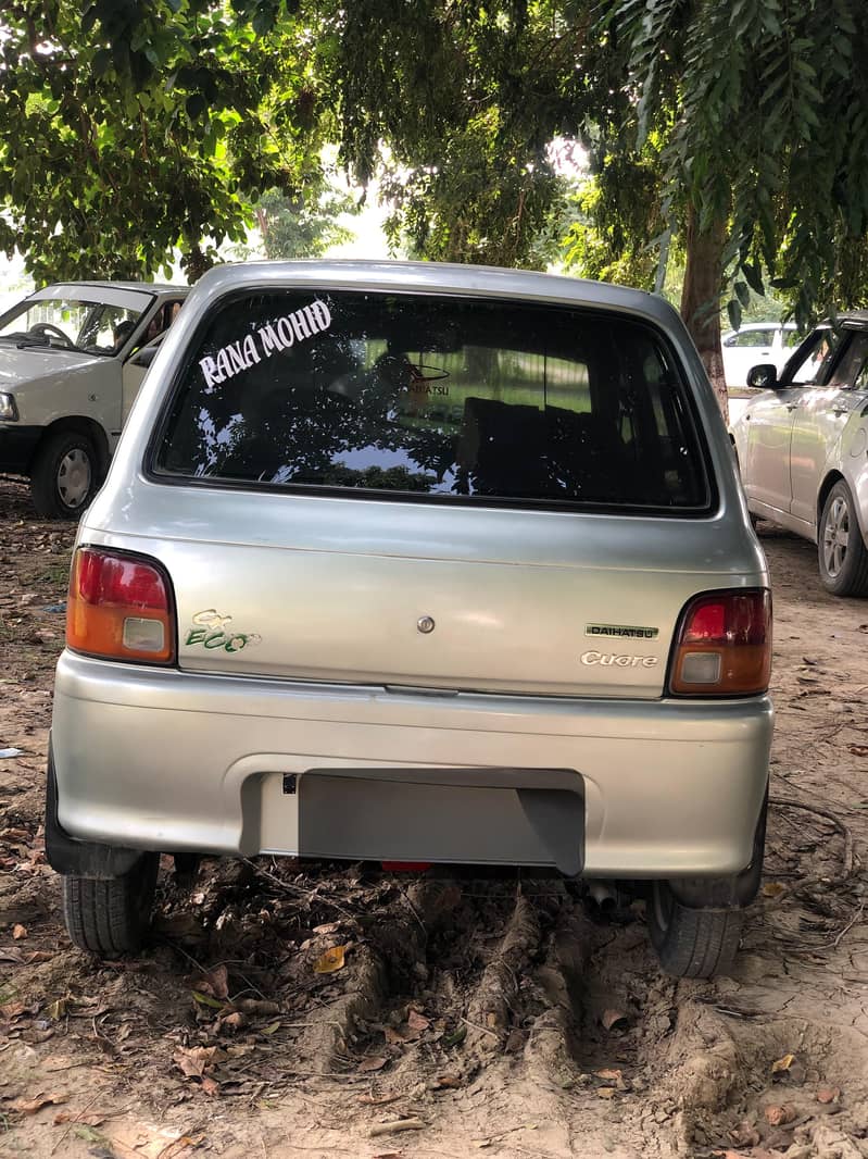Daihatsu Cuore 2007 - Cars - 1120373225