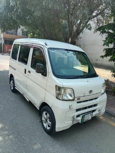 Hijet 2011 modle teen pice ki touching ha 0/3/0/6/4/1/4/9/8/6/4