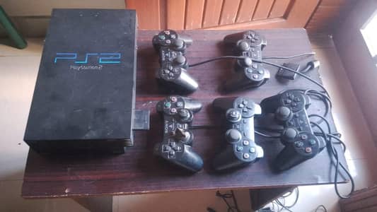 PS 2fat  original playsation 2 +5 controller 100 woiking