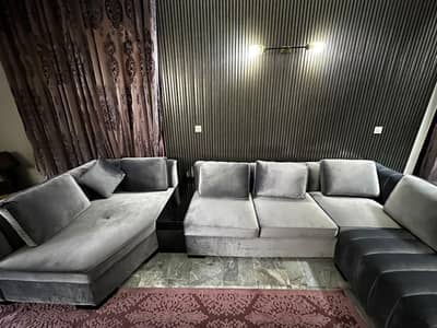 L shaped 9 seater sofa with two tables