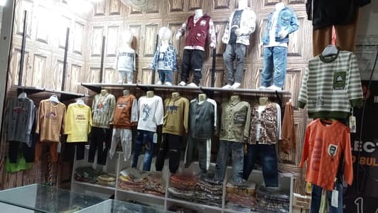 Complete Kids Wear Business Setup with Stock & Furniture. "