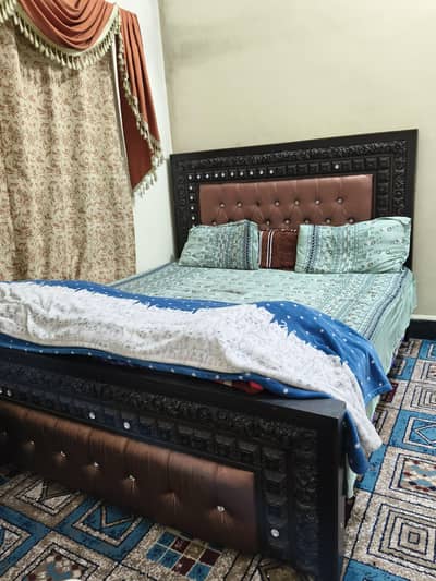 double bed without mattress.
