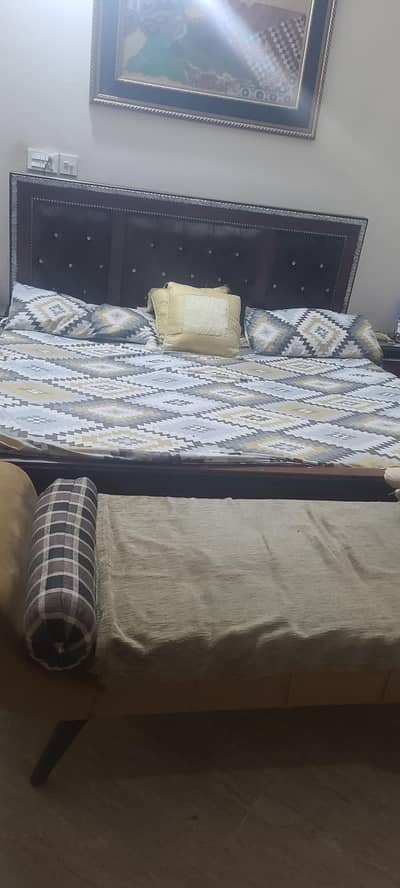 bed with two side table