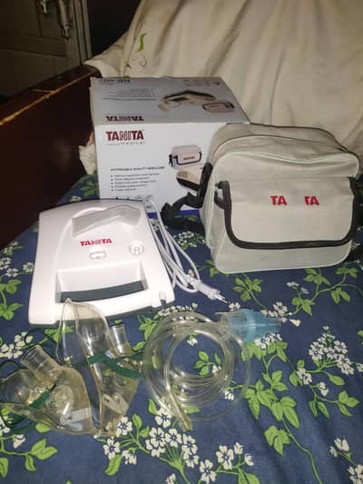 TANITA medical. Nebulizer With Full Equipments (masks , pipes. ) etc.