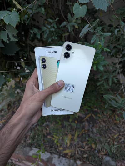 Samsung Mobile A06 4/64gb with box cable no open repair