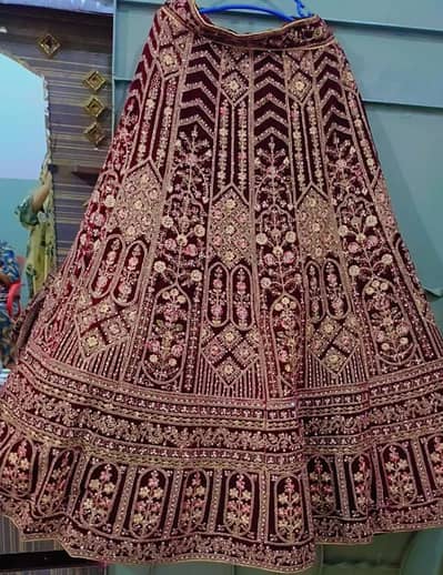 bridal mahroon velvet lahenga heavy embroidery