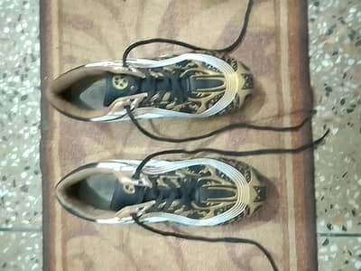 38 size Daclay Football studs shoes golden black color