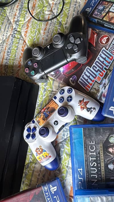 PS4 with 2 Controllers and 6 Games