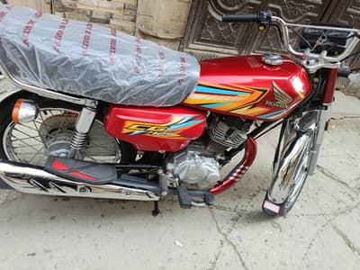 honda 125 model 25)26 milage 2890