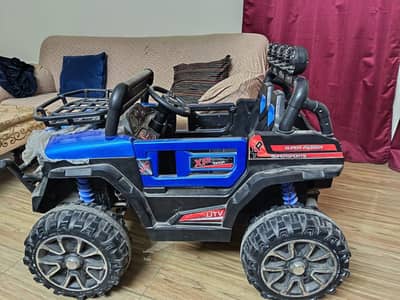 Title: Kids Electric Ride-On Jeep UTV XP 1000R – Blue & Black