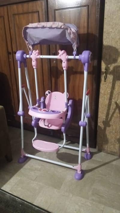Kids Garden Swing (Model 108) in purple and pink.