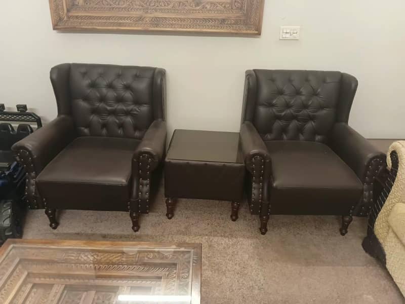 2 Single seater sofa with Table 0